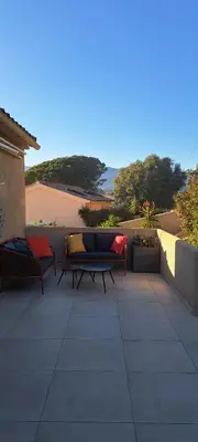 a view of a swimming pool with a cactus at Edith et Jean-Paul in Porto-Vecchio