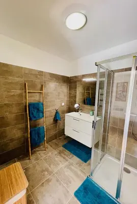 a bathroom with a shower and a sink at Ajaccio T2 grand standing neuf - centre ville et plages - 4 personnes - parking privé in Ajaccio