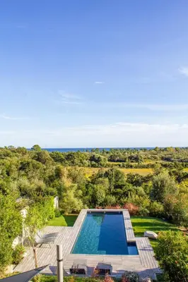 an overhead view of a swimming pool in a house at Villa Santa Lucia Di Fautea in Sainte-Lucie de Porto-Vecchio