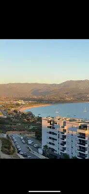 an aerial view of a city with a lake and buildings at T1 proche aéroport et plage in Ajaccio
