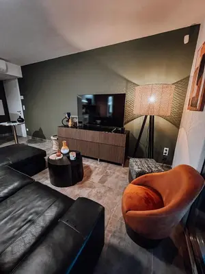 a living room with a couch and a television at CASA GIABICONI - Villa 6pers. piscine & spa in Occhiatana