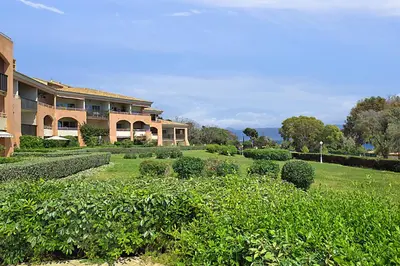 a large house with a garden in front of it at Studio Rossi - Ajaccio - Welkeys in Ajaccio