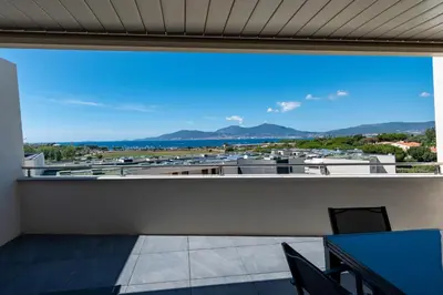 a view from the balcony of a building at Vita in Grosseto-Prugna