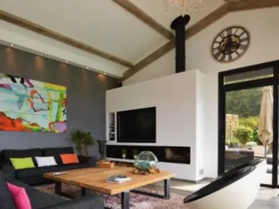 a living room with a couch and a table at Villa St Exupery in Oletta