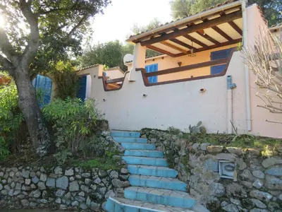 a set of stairs in front of a house at Mini Villa St-Lucie Porto-Vecchio vue mer 5mnplage in Zonza
