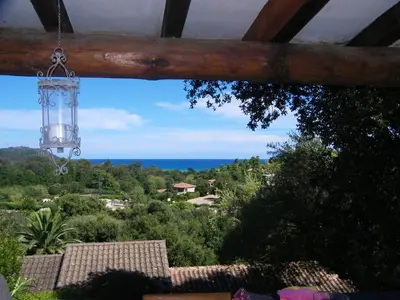 a view of the ocean from a house at Mini Villa St-Lucie Porto-Vecchio vue mer 5mnplage in Zonza