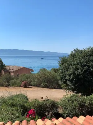 a view of the ocean from a house at Appartement « Marinella » splendide vue mer aux Sanguinaires in Ajaccio