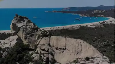 a view of a mountain with a beach and water at SARTENE t3 CALME ENSOLEILLÉ PARKING PRIVÉ in Sartène