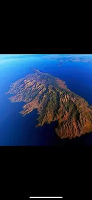 an aerial view of an island in the water at SUPERBE APPARTEMENT FACE AUX ILES SANGUINAIRES in Ajaccio