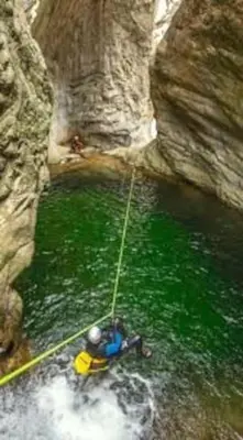 a person on a raft in the water with a rope at Vos vacances à Lama France Corse in Lama