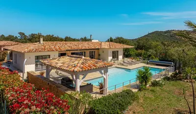 an image of a house with a swimming pool at Villa Les Arbousiers - Piscine Chauffée Sécurisée - 210m2 - 4 Suites in Porto-Vecchio