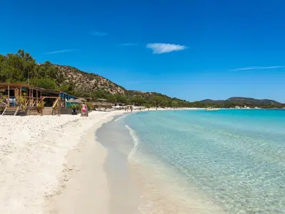 a view of a beach with people on it at Apartment Cita Di Sali 13 by Interhome in Porto-Vecchio