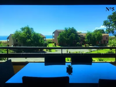 a view of the ocean from the balcony of a house at Vista Mare Ghisonaccia in Ghisonaccia