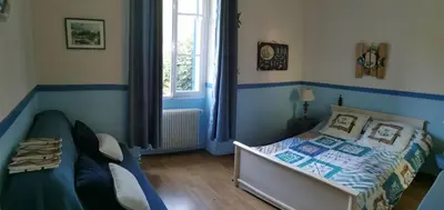 a bedroom with a bed and a couch in it at Casa Maria in Vico