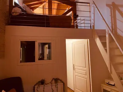 a room with a staircase with a door and a stair case at VILLA SANTONI in Porticcio
