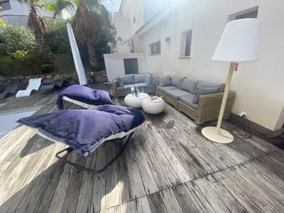 a living room with two chairs and a couch at Appartement - Maison 