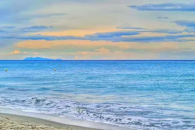 a view of the ocean from the beach at Magnifique villa avec piscine en bord de Mer in Lucciana