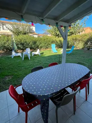 a polka dot table and chairs on a patio at Casa in Cervione