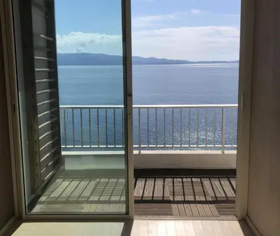 a view of the ocean from a balcony at AJACCiO VUE MER ET GOLFE in Ajaccio