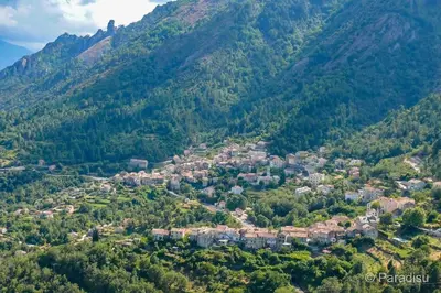 a small town in the middle of a mountain at Studio Venaco Centre Corse in Venaco