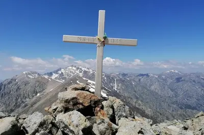 a cross on the top of a mountain at Studio Venaco Centre Corse in Venaco