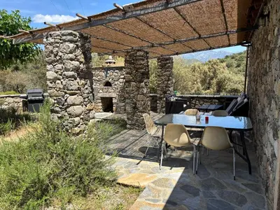 a drawing of a house with a stone fireplace at Maison en pierre corse avec vue entre mer et montagne in Moltifao