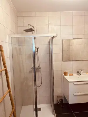 a bathroom with a shower and a sink at SUPERBE STUDIO AVEC PLACE DE PARKING in Ajaccio