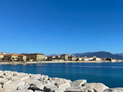 a large body of water with buildings in the background at Studio neuf et lumineux - Ajaccio centre - Place Miot/Albert 1er in Ajaccio
