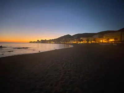 a view of the beach at night at Studio neuf et lumineux - Ajaccio centre - Place Miot/Albert 1er in Ajaccio