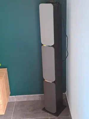 a refrigerator in a corner of a room at Villa climatisée avec piscine in Sari Solenzara