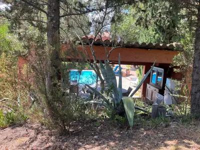 a house in the middle of the forest at Casa de Patarra gîte dans le maquis avec piscine privée in Peri