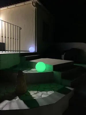 a green light in a dark room with stairs at Panorama exceptionnel sur les hauteurs de Propriano in Propriano