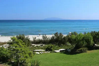 a view of a beach with the ocean at Apartment by Lido Beach & Biguglia Lagoon in Borgo