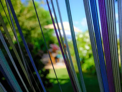a close up of a stack of colorful blinds at Petit coin de paradis, vue panoramique mer &montagne, piscine privée... in Calcatoggio