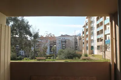 a view from an open window of a building at Location Ajaccio in Ajaccio