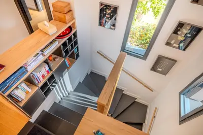 an overhead view of a staircase in a tiny house at Villa Terra Bella hauteur de la ville avec piscine et vue mer in Propriano