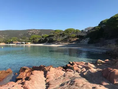 a view of a beach with rocks in the water at CORSACASA Villa in Palombaggia sea view in Porto-Vecchio
