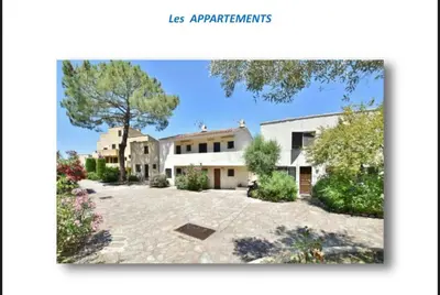 an image of a house with a driveway at Appartement terrasse 1 chambre in Porticcio