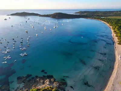 an aerial view of a harbor with boats in the water at Les Regalia Hôtel & Spa in Sainte-Lucie de Porto-Vecchio