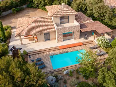 an aerial view of a house with a swimming pool at Villa Terra Vecchia, 6 ou 12 personnes, vue imprenable, piscine chauffée in Porto-Vecchio
