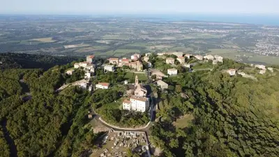 an aerial view of a large house on a hill at Casa Elena in Ajola