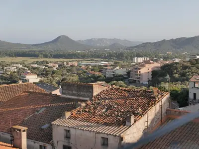 an aerial view of a town with roofs at Hotel Moderne in Porto-Vecchio