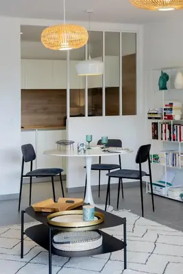 a dining room with a table and chairs at Domaine d'Arca - Hugo 06 - 2 pers in Porto-Vecchio