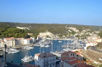 a harbor filled with lots of boats in the water at Les Hauts du Port-Appartement neuf sur le port in Bonifacio