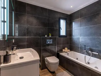 a bathroom with a sink and a shower at Holiday Home Villa les lieges by Interhome in Lecci