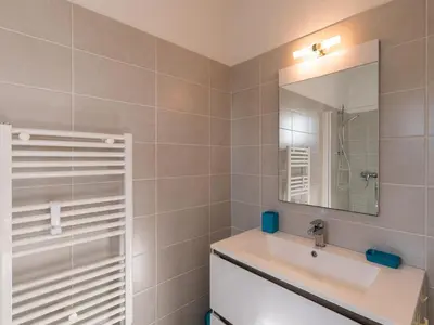 a bathroom with a sink and a mirror at Villa Villa Fautea by Interhome in Sainte-Lucie de Porto-Vecchio