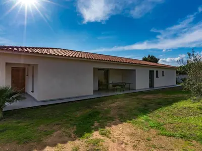 a small white house with a large backyard at Villa Villa Fautea by Interhome in Sainte-Lucie de Porto-Vecchio