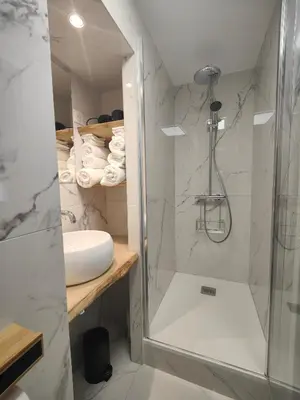 a bathroom with a shower and a sink at Studio rue Fesch in Ajaccio
