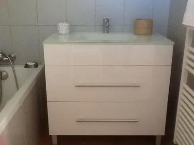 a white dresser with a sink in a bathroom at LE PALADIN Porto Pollo Villa privée avec piscine chauffée in Serra-di-Ferro
