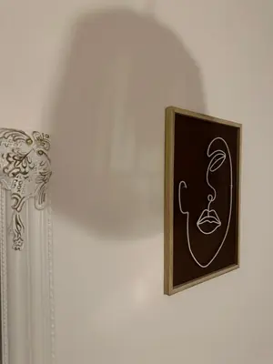 a picture of a drawing of a snake on a wall at Appartement Agosta Plage in Porticcio